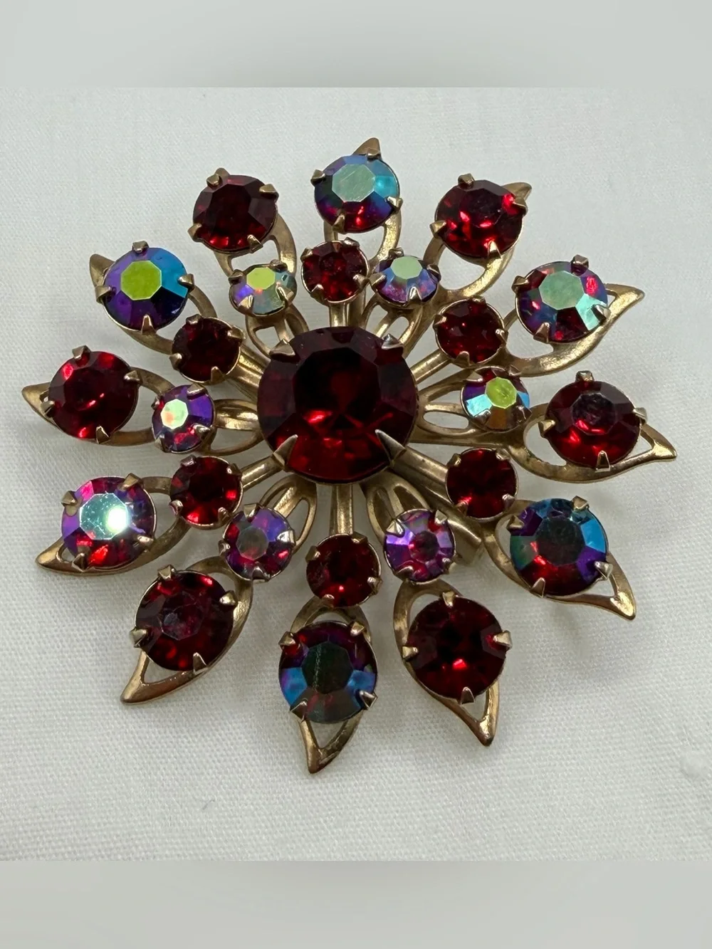 Vintage Starburst Brooch Pin Goldtone Faceted Deep Red Iridescent Rhinestones